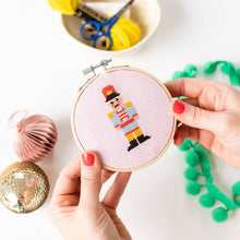 Load image into Gallery viewer, Christmas Nutcracker Cross Stitch Kit: Light Pink With Multicoloured Thread