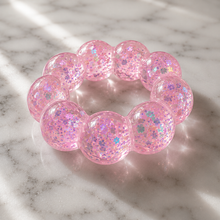 Load image into Gallery viewer, Feelzies™ Original Squishy Bracelet: Bubblegum Glow
