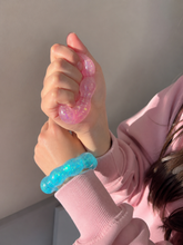 Load image into Gallery viewer, Feelzies™ Original Squishy Bracelet: Bubblegum Glow

